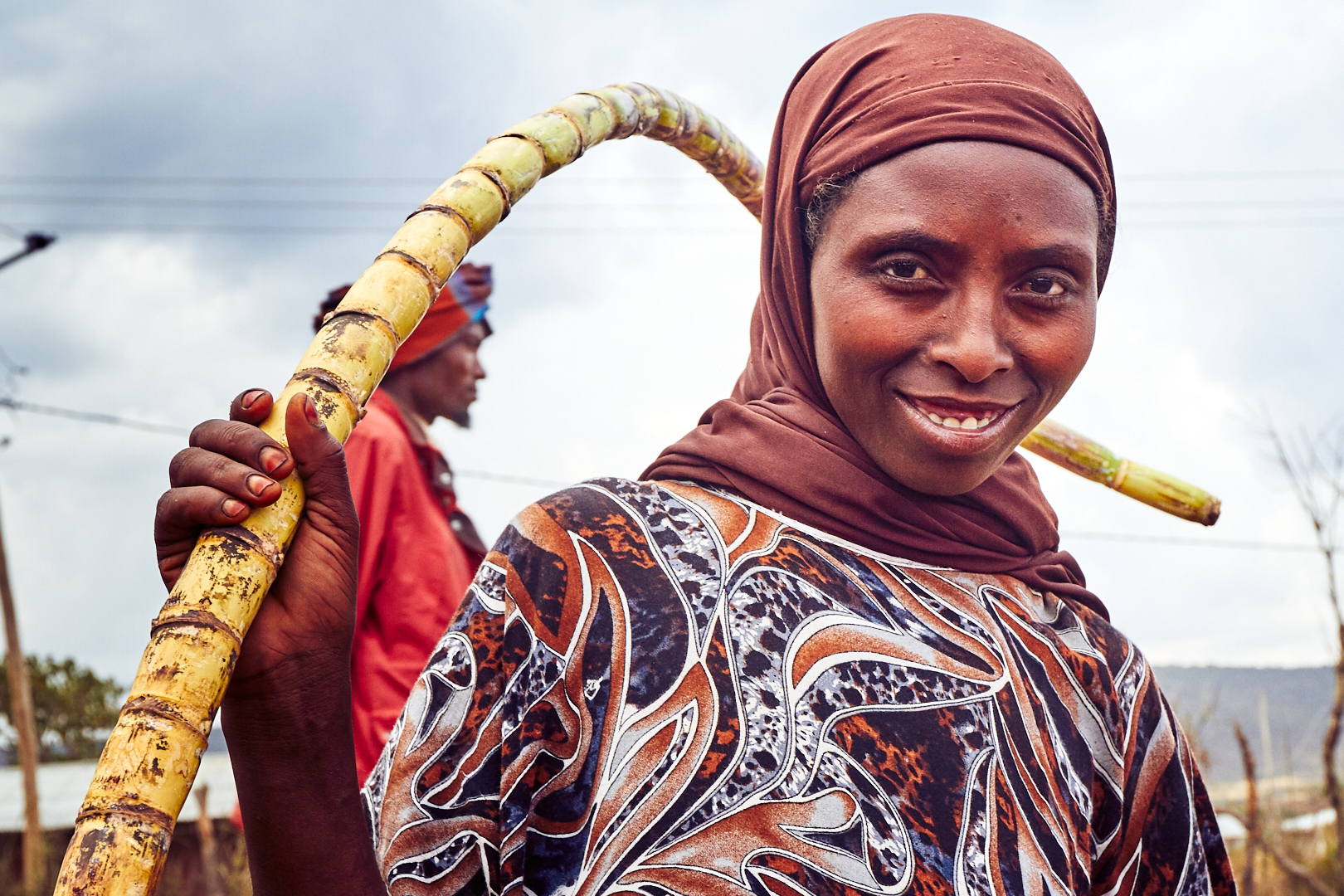 Pvk Photo | Photographe Professionnel | Portrait d'une femme ethiopienne tenant une canne à sucre